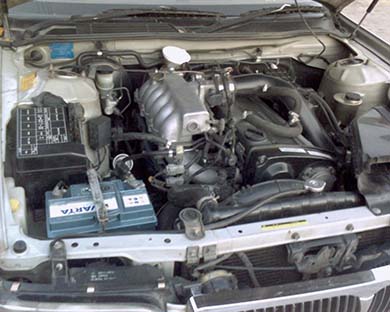 Замена жидкости в автоматической коробке передач Nissan Laurel